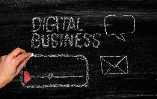 Digital business concept on chalkboard