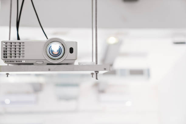 istock The video projector is suspended from the ceiling to show presentations 1462171325