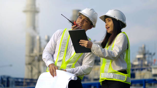 istock Two industrial engineer working near the electrical plant. 1462175374