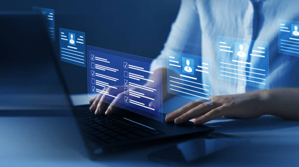 istock Employees must complete the online survey form, answer the test questions.Marked checklist on a clipboard. Human resources and management concept. 1462180878