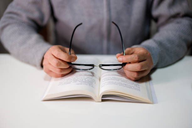 istock Man working or studying with book . Business and education concept 1462183809