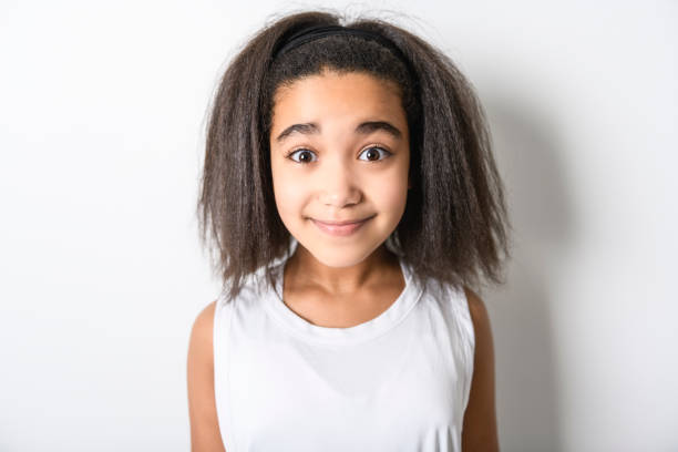 istock Adorable 9 years child girl on studio white background 1462185540