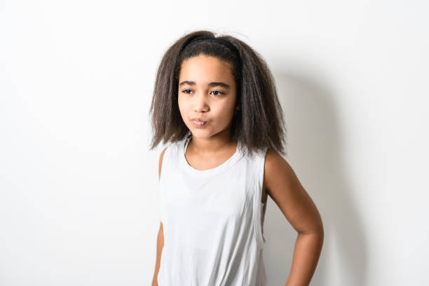 istock Adorable 9 years child girl on studio white background 1462185544