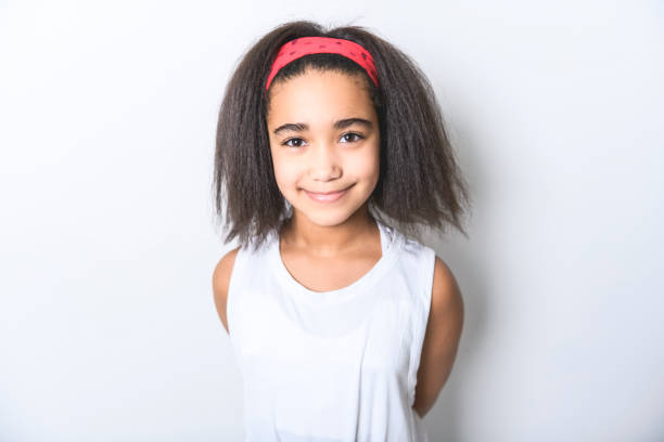 istock Adorable 9 years child girl on studio white background 1462185732