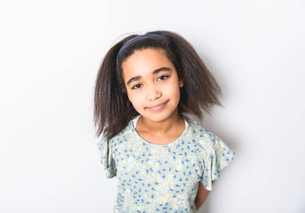 istock Adorable 9 years child girl on studio white background 1462187566