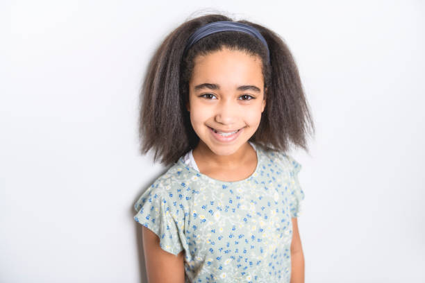 istock Adorable 9 years child girl on studio white background 1462187573