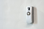 Electronic key access system door lock on the wall.