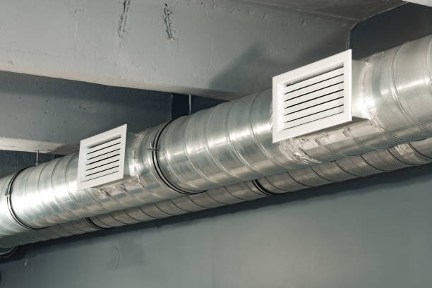 istock Silver ventilation pipes hanging from the ceiling inside the building 1462187770
