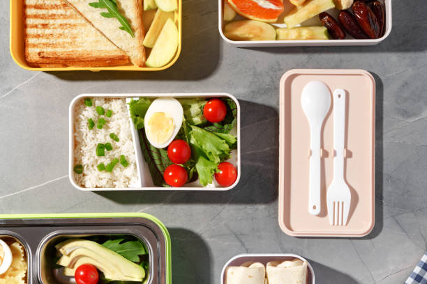 istock Containers with healthy food on gray background top view. 1462187819