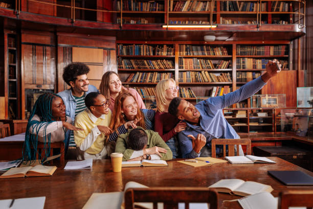 istock Students take selfie with friend asleep. 1462188105