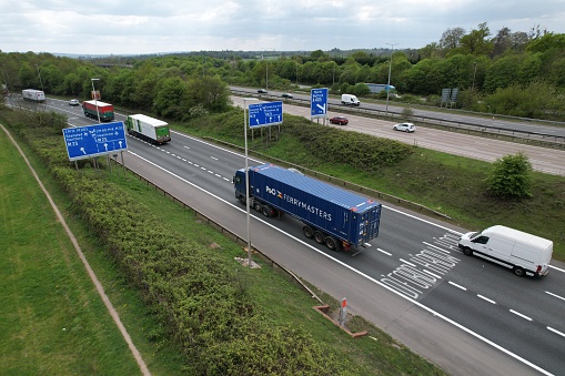 Lorries on  M25 motorway UK drone aerial view