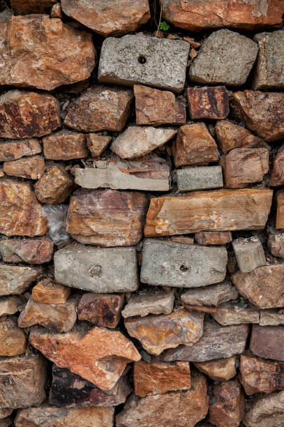istock Grunge wall background with old stones texture 1462196560