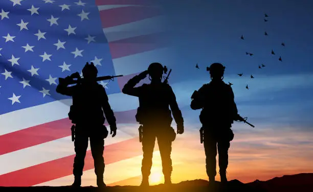 Vector illustration of Silhouettes of army soldiers with USA flag