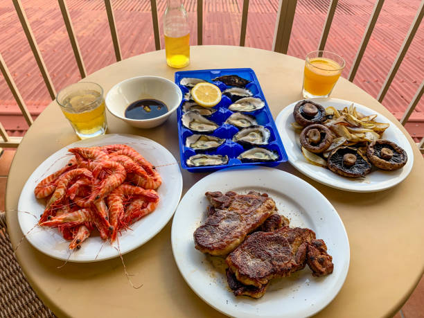 istock Cooked local seafood and lamb, Airlie Beach, Australia 1462199968