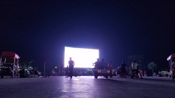 istock People watching the big screen in the square 1462200901