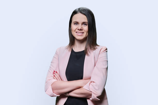istock Confident business young female looking at camera on white background 1462204220
