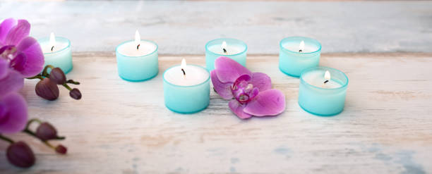 istock Spa decoration with purple orchids 1462206634