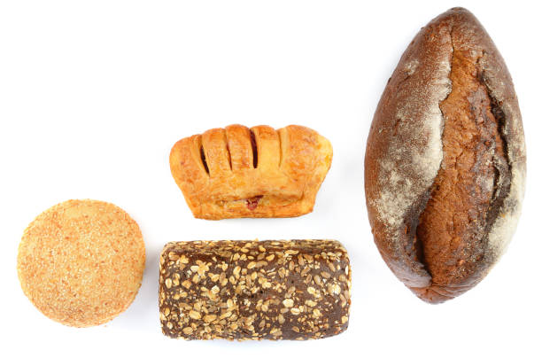 istock Bread and sweet pastry isolated on white. View from above. Free space for text. 1462208437