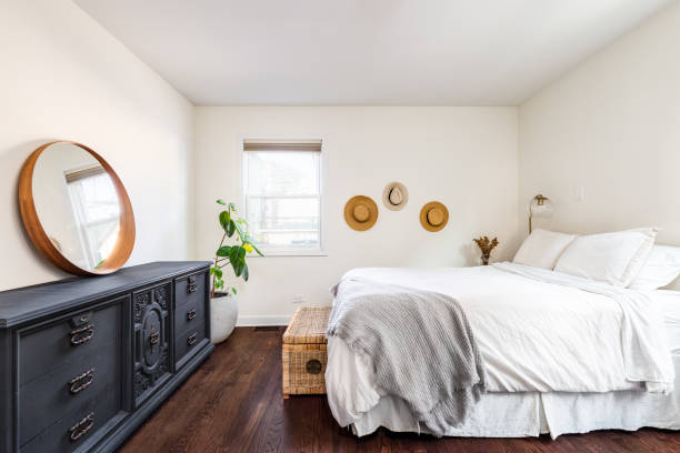 istock A cozy bedroom with hardwood floors. 1462209561