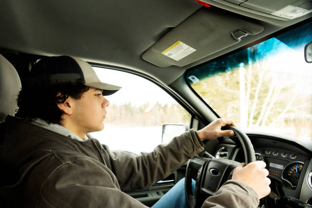 istock Teen boy driving 1462211273
