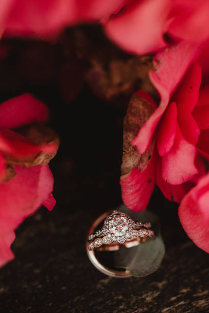 istock Wedding rings with flowers 1462212723