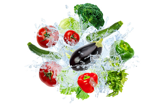 Fresh vegetables splashing in clear water splash. Concept healthy diet food diet