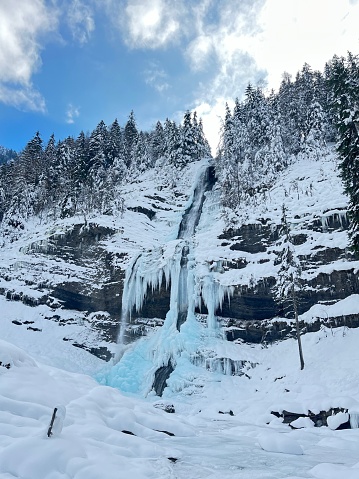 A frozen waterfall in the mountain.