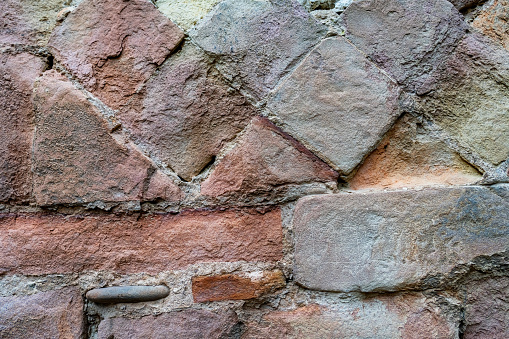 Part of ancient wall. Background nature bricks. Close up