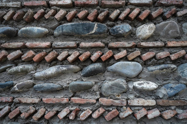 Part of ancient wall. Background nature bricks. Close up stock photo
