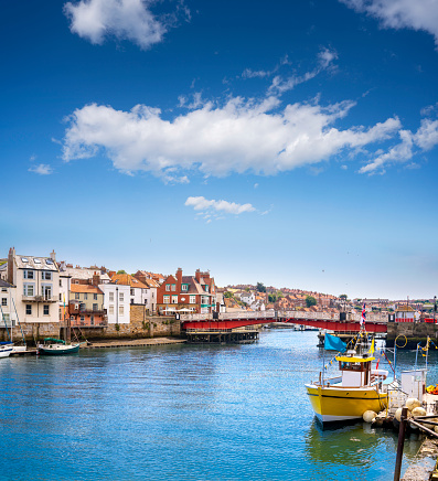 Whitby skyline and swing bridge over river Esk UK in Scarborough Borough Concil of England United Kingdom