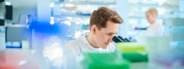 istock male biochemist in the lab 1462221264