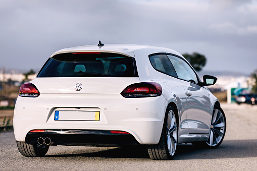 Muulhouse - France - 7 February 2021 - Rear view of new white Volkswgen Golf GTI parked in the street