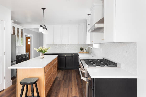 istock A farmhouse kitchen with white and wood cabinets. 1462227835