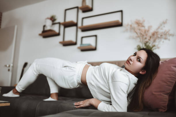 istock Back Stretches In Bed After Nap For Beautiful Female 1462245460