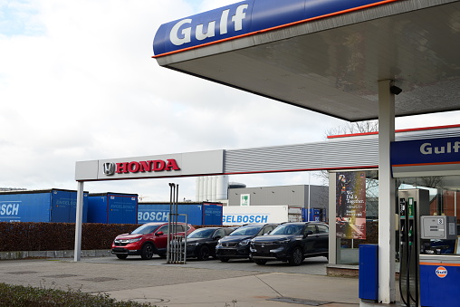 Tienen, Flemish-Brabant, Belgium - February 02, 2023: 4 stationary Honda cars on the parking of Gulf petrol station.