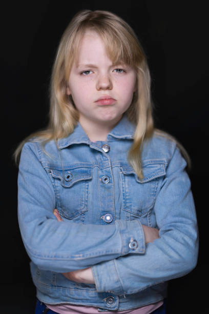 istock Grumpy 10-year-old blonde girl 1462258049
