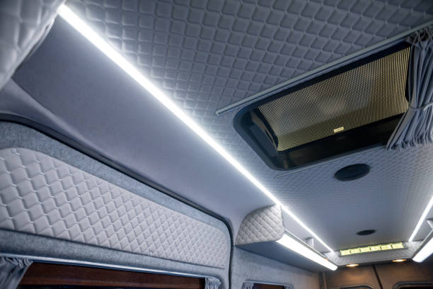 istock Comfortable interior of a passenger bus with soft seats 1462260789