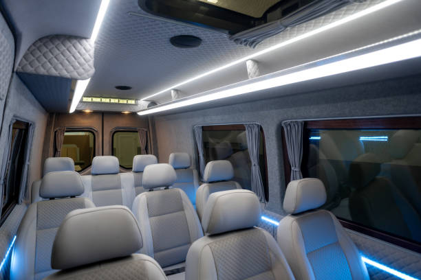 istock Comfortable interior of a passenger bus with soft seats 1462261312