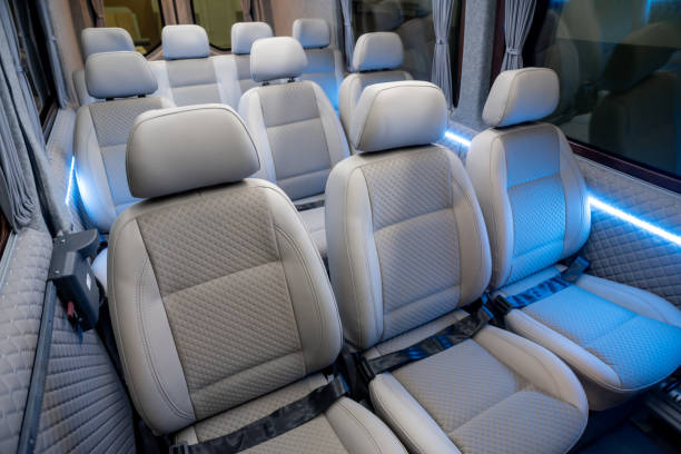 istock Comfortable interior of a passenger bus with soft seats 1462261321