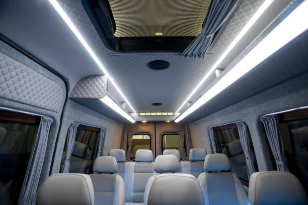 istock Comfortable interior of a passenger bus with soft seats 1462261345