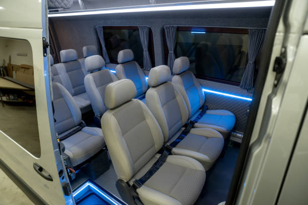 istock Comfortable interior of a passenger bus with soft seats 1462261376