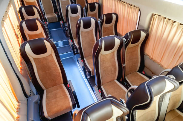 istock Comfortable interior of a passenger bus with soft seats 1462263135