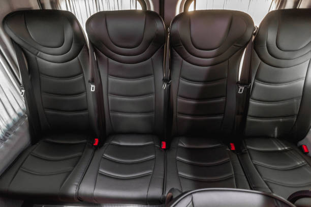 istock Comfortable interior of a passenger bus with soft seats 1462263238