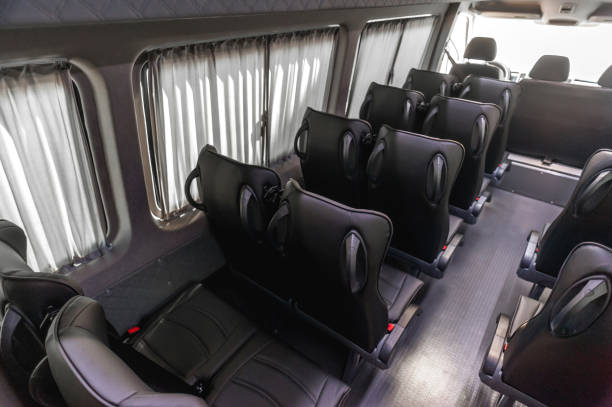 istock Comfortable interior of a passenger bus with soft seats 1462263256