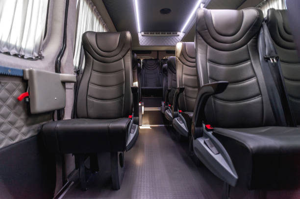 istock Comfortable interior of a passenger bus with soft seats 1462263265