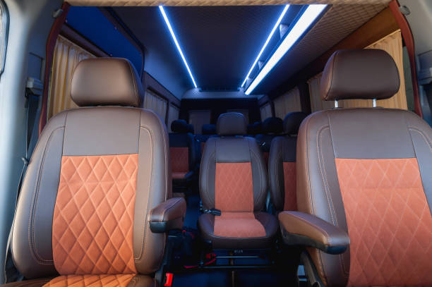 istock Comfortable interior of a passenger bus with soft seats 1462263492