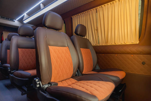 istock Comfortable interior of a passenger bus with soft seats 1462263503
