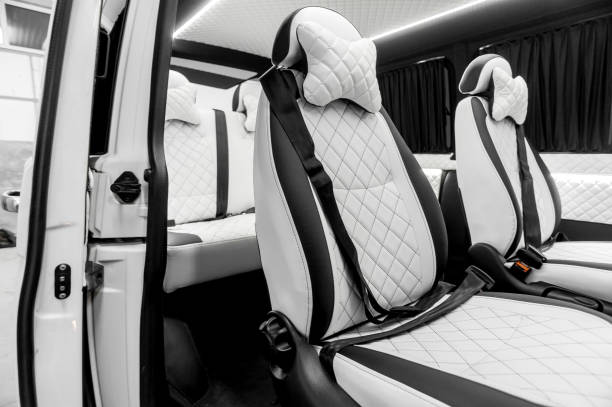 istock Comfortable interior of a passenger bus with soft seats 1462267347