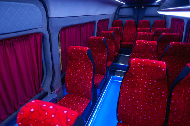 istock Comfortable interior of a passenger bus with soft seats 1462267519