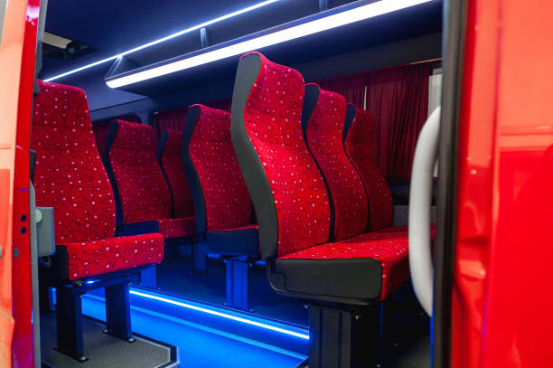 istock Comfortable interior of a passenger bus with soft seats 1462267689